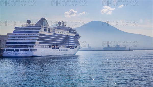 Cruise ship at Statione Marittima in port with Mount Vesuvius