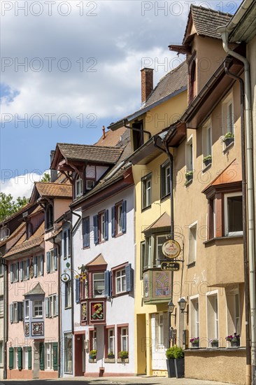 Old town with old traditional houses with bay windows in Black Forest style