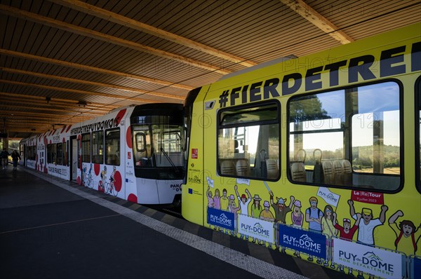 Bottom station of the Panoramique des Domes rack railway in Tour de France 2023 all-car advertising