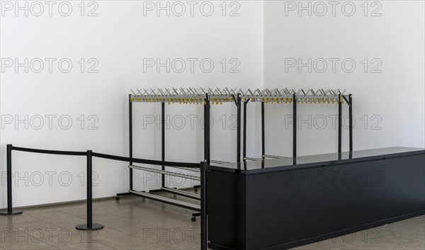 Empty coat racks in a public building