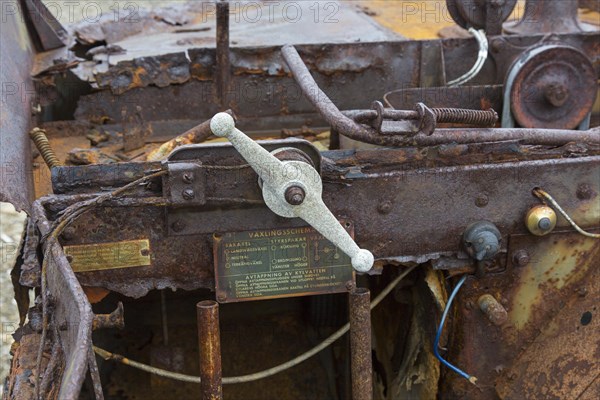 Rusty amphibian vehicle at deserted 1950s Kinnvika Arctic research station