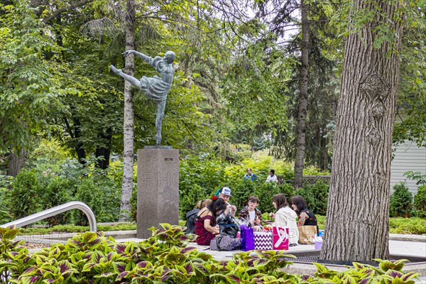 Visitors picnicking in Assiniboine Park