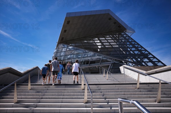 People in the entrance area of the Musee des Confluences museum