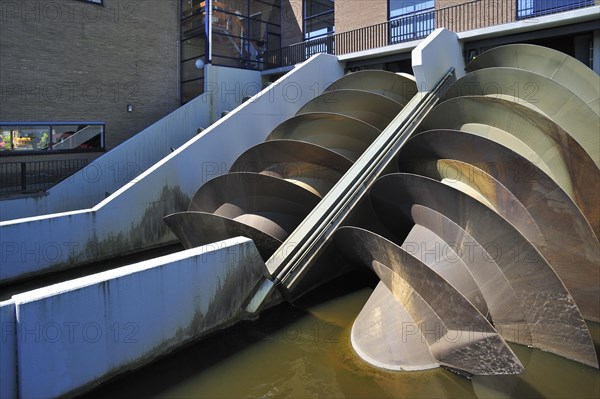 Modern Archimedes screws of pumping station used to drain the polders at Kinderdijk in Holland