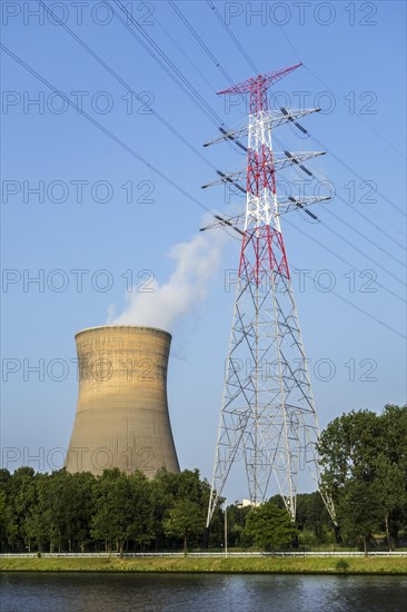 High voltage pylon and cooling tower of the Electrabel power station along the Ghent-Terneuzen Canal at Ghent seaport