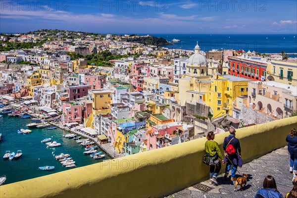 Panorama of the village with the church of Santa Maria delle Grazie and the fishing port in the bay of the fishing village of Corricella