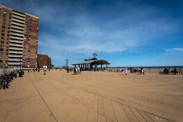 Listening to the ocean waves on a sunny spring day on the Brighton Beach