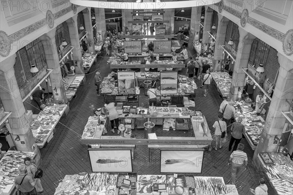 Black and white photo panorama of the hall from a bird's eye view of the stalls with crabs