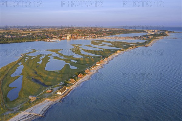 Aerial view over houses on the shore along the Baltic Sea coast at Steinwarder peninsula