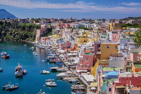 Panorama of the village with the fishing harbour in the bay of the fishing village of Corricella