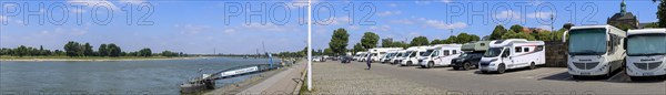 Panoramic photo of motorhome pitches on the banks of the Rhine