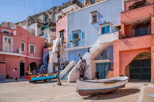 Shore with fishing boats on the waterfront of the fishing village of Corricella