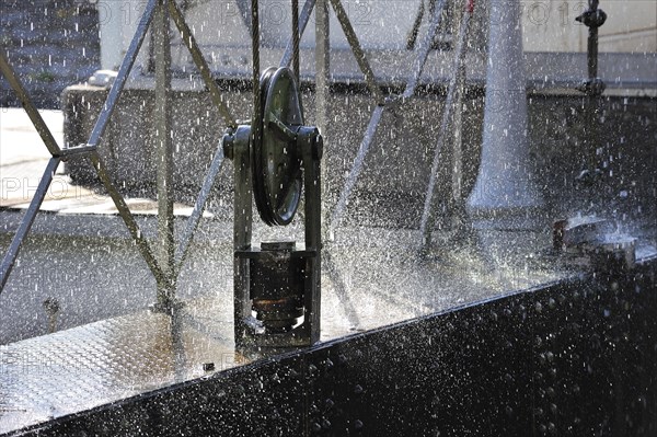 Water pouring down from caisson of hydraulic boat lift on the old Canal du Centre at Houdeng-Goegnies near La Louviere in the Sillon industriel of Wallonia