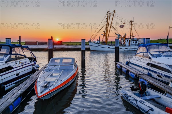 Sielhafen with crab cutter at sunset