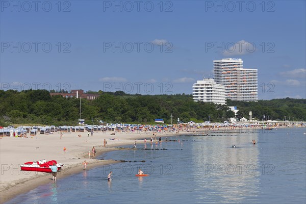 Maritim Hotel and roofed wicker beach chairs along the Baltic Sea at Timmendorfer Strand