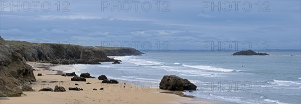 Surfers along the Cote Sauvage at Quiberon