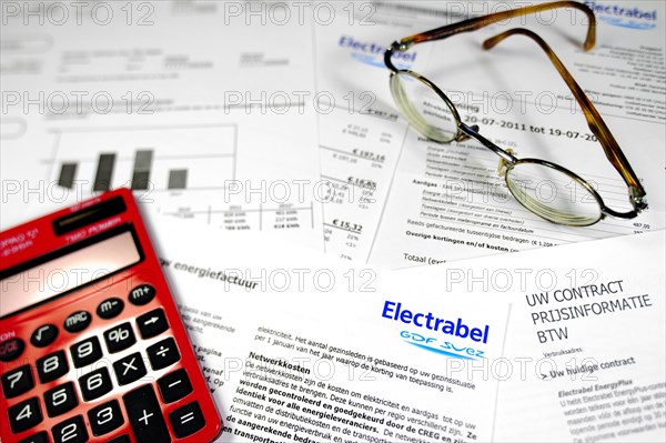 Red calculator and Flemish invoice of Electrabel