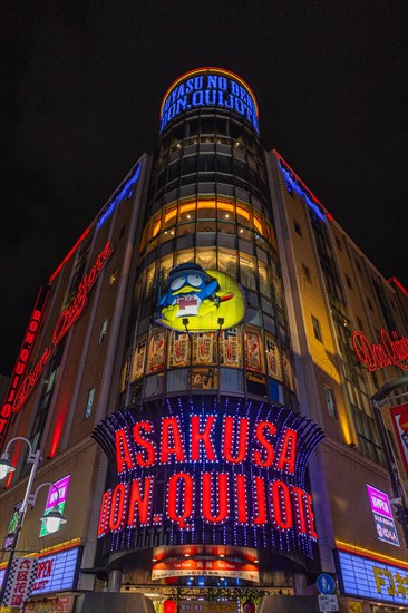 Bargain market Don Quijote with neon sign