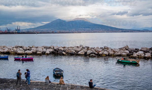 Boat harbour with Vesuvius