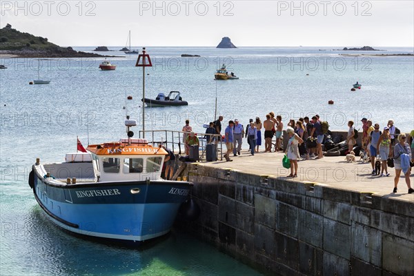 Group of tourists on jetty