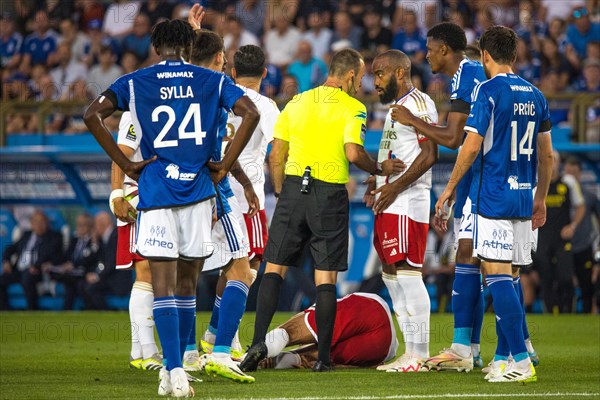 Referee Jerome BRISARD head to head with captain Alexandre LACAZETTE