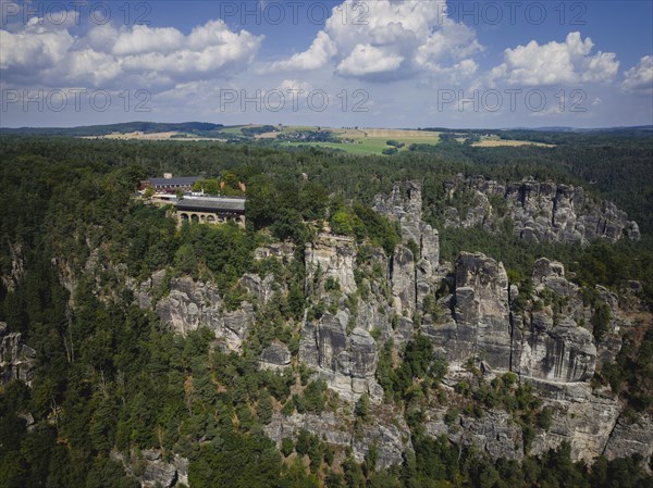 Aerial view of Rathen on the Elbe with the rocks of the Basteige area and the new viewing platform on the Bastei.