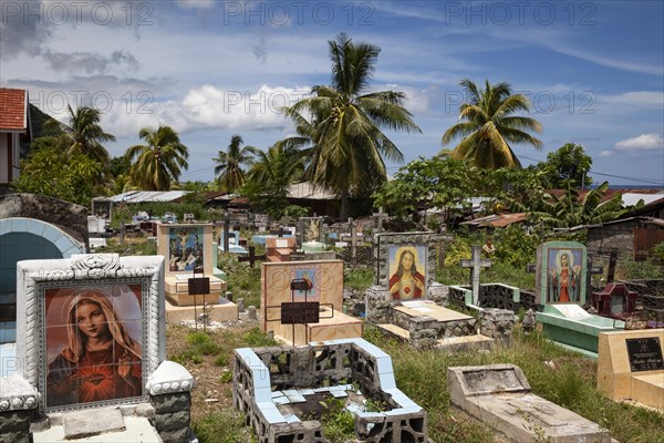 Old Christian cemetery with images of saints