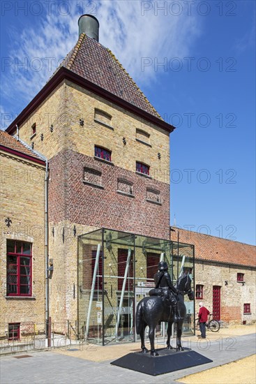 Statue of German lancer in front of the Kaethe Kollwitz Museum