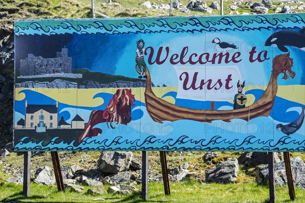 Colourful welcome to Unst board painted by local school children at Belmont on the island Unst