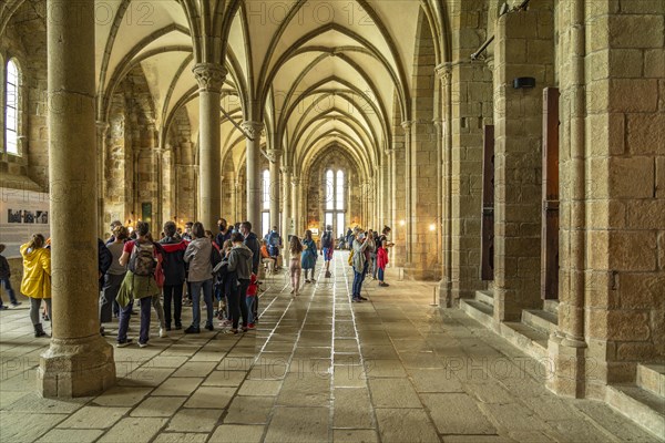 Tourists in the guest room La Salle des Hotes