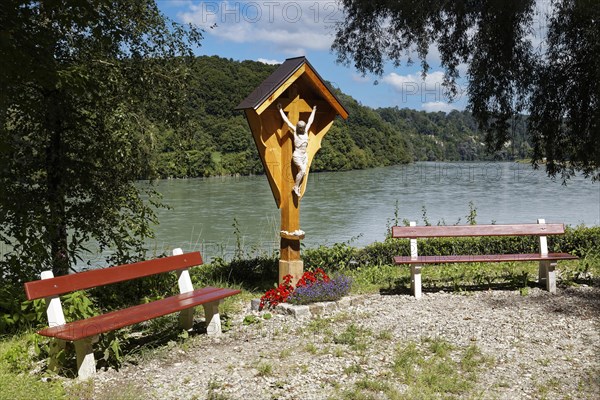 Wooden cross with Christ and roof