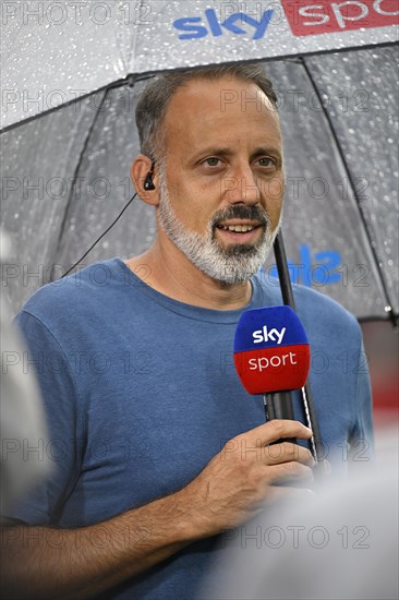 Coach Pellegrino Matarazzo TSG 1899 Hoffenheim in interview Microphone Logo Umbrella
