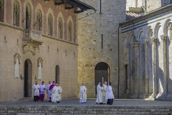 Priest on his way to Mass in the Cathedral di San Cerbone