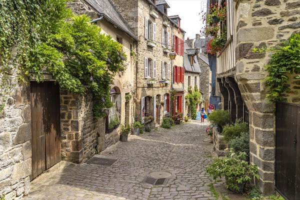 Alley with cobblestones in the historic old town of Dinan