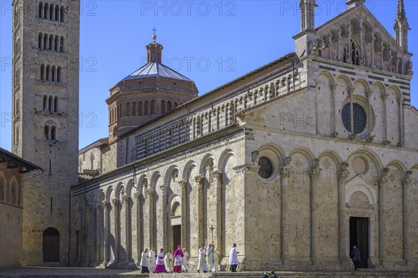 Priest on his way to Mass in the Cathedral di San Cerbone