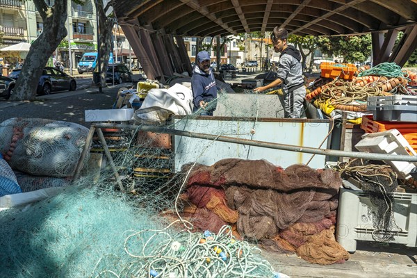 Fisherman with net at work