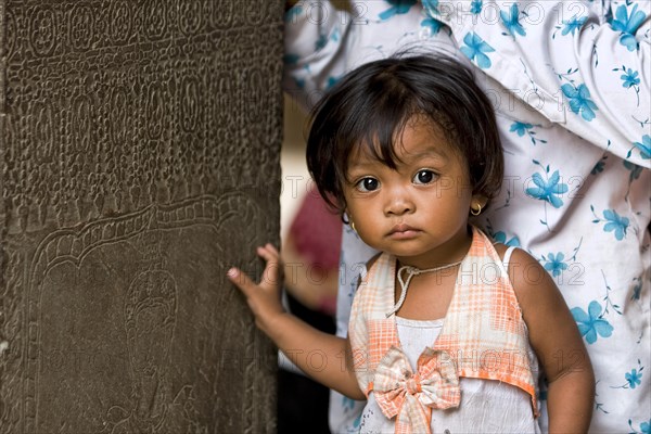 Little girl in Angkor Wat