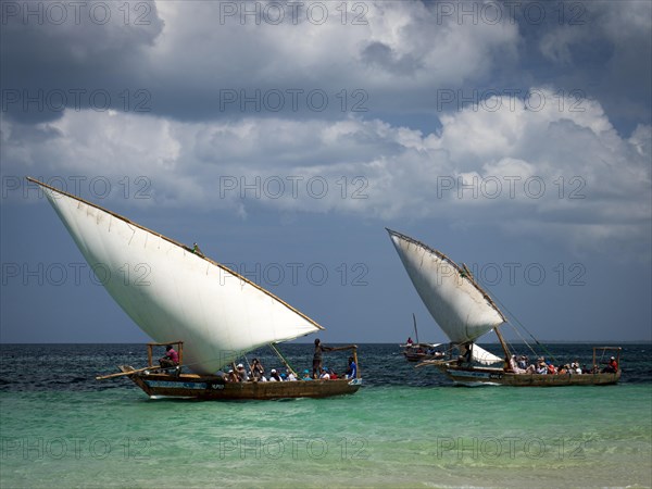 Boats with white sails