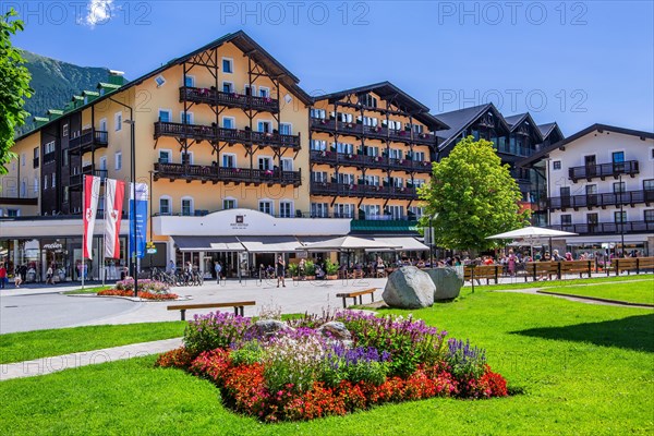 Flower border on the village square with hotels