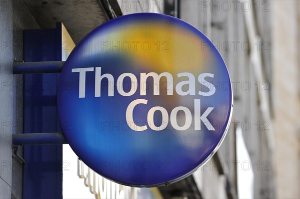 Signboard with logo of Thomas Cook travel agency