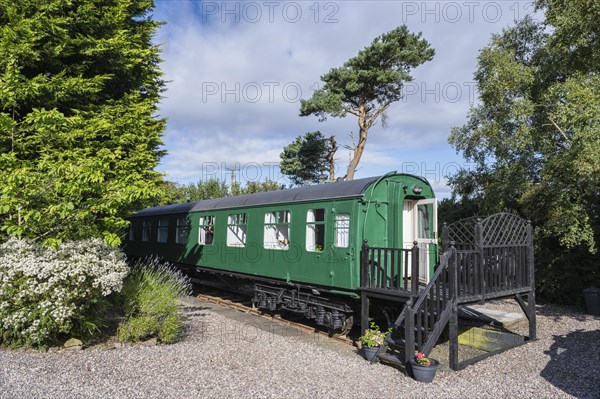 Old railway carriage converted into a stationary hostel