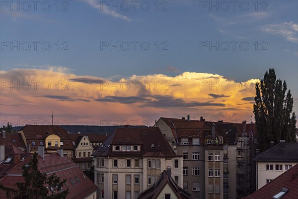 Thunderclouds over the houses of the city