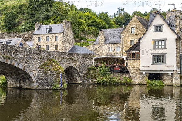 Medieval buildings and stone bridge on the river Rance in Dinan