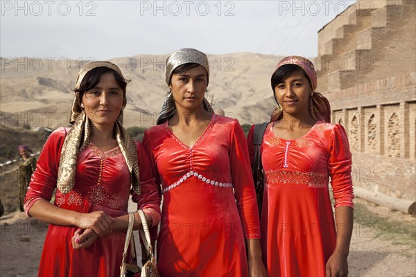 Women with red dresses