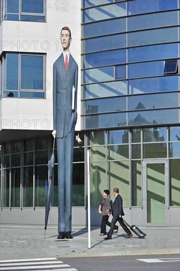 Sculpture The Long Banker in front of the Deka Bank at Kirchberg