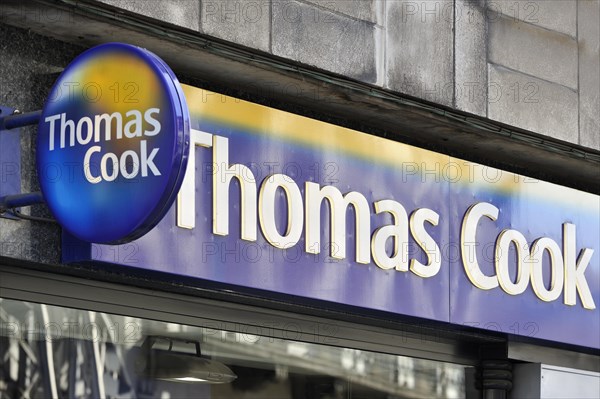 Signboard with logo of Thomas Cook travel agency