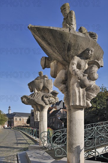 Sculptures of artist Walter De Buck at the Emperor Charles V Bridge over the river Lieve at Ghent