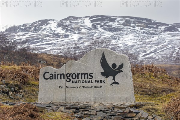 Cairngorms National Park entrance sign in winter
