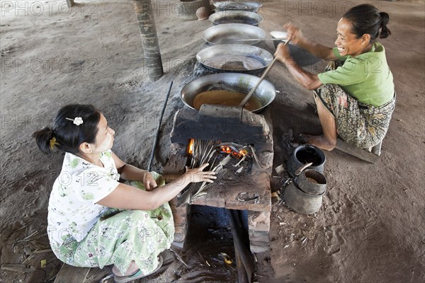 Women making liquor