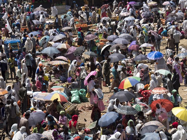 Many people crowded around the market